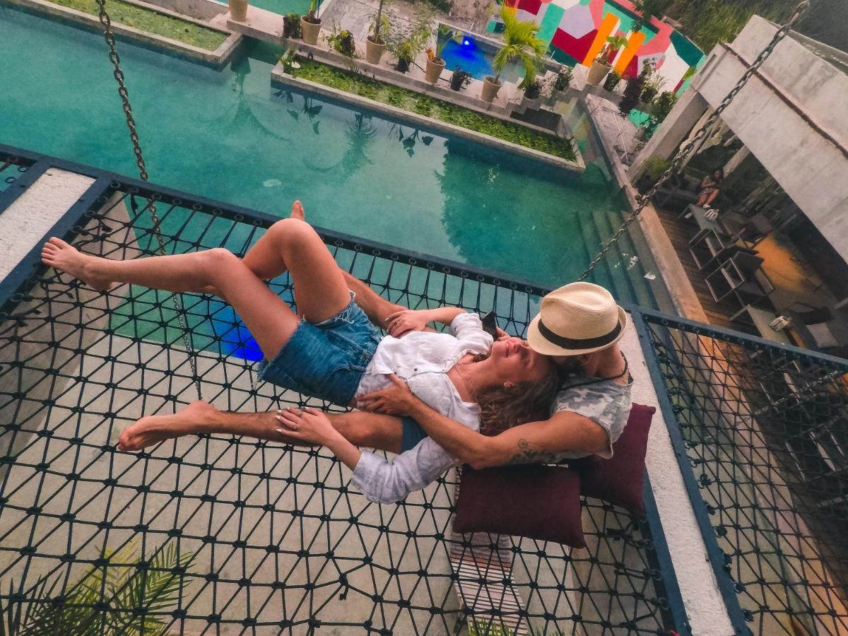 Hotel Makaabá Eco-Boutique Bacalar Esterno foto A couple on a hammock